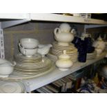 A Royal Doulton Berkshire part dinner service comprising meat plates, dinner plates, gravy boats,