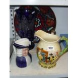 A Crown Devon Fieldings Auld Lang Syne musical jug, Royal Doulton figurine Winsome HN 2220, a