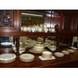 A Grindley dinner and tea service in Chameleon pattern 46. (On 925)