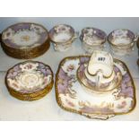 An unusual early 20th century lilac-ground Coalport tea set in 'batwing' pattern Y.2665,