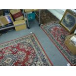 Two machine-made rugs and a small Eastern rug the outer border formed from coloured diamonds (