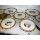 A Victorian bone china topographical dessert service, each piece with a circular vignette of a named