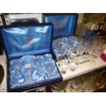 Four box sets of Thomas Webb crystal glasses to include champagne saucers, port glasses, champagne