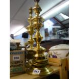 A pair of brass table lamps. (Pine shelves at end of S 21)