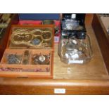 A quantity of costume jewellery including old watches, two gold-plated $1 pieces, earrings, bangles,