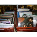 Two crates containing 33RPM records, mainly rock and pop albums by Rod Stewart, Neil Sedaka, Otis