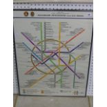 A 1989 map of the Moscow Underground, with insignia for Lenin and the USSR (73 x 56 cms), framed (