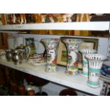 A shelf of good china wares to include a musical character jug, a 19th century blue and white bowl