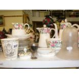 A Crown Staffordshire floral decorated part tea service to include teapot, hot water jug, cream jug,