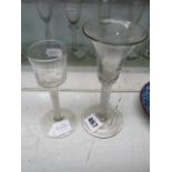 Two 18th century wine glasses, one with part-fluted ogee bowl on opaque twist stem, the other with