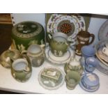 A quantity of green Wedgewood Jasperware including a 19th century cheese dome and cover, jugs,