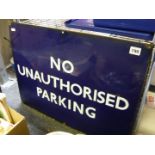 A blue enamelled 'No unauthorized Parking' sign.