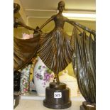 A Talos Gallery large bronze figure of a dancer fanning our her skirt, after Chiparus, dark base,