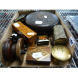 A lot containing trinket boxes; wooden, brass, gilt decorated, a wooden fishing reel and a large