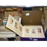 Albums of mounted picture, tea and cigarette cards covering many areas of interest, from transport