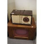 A vintage 1950's Stella Bakelite radio and a wooden cased television by Pye. (Under S 82)