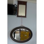 A 19th century mahogany peer glass mirror with central shell-like decoration and a 1930's oak oval