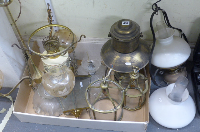 A box of lantern style ceiling lights plus a three branch candelabra and a brass and glass oil lamp,