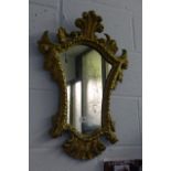 A probably 18th century continental gilt framed mirror.