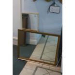 A cream painted mirror and a rectangular gilt framed mirror.