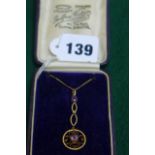 A 9 ct gold amethyst and pearl pendant and chain.