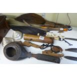 An assortment of vintage and antique native artefacts, including two daggers, four fly whisks, two