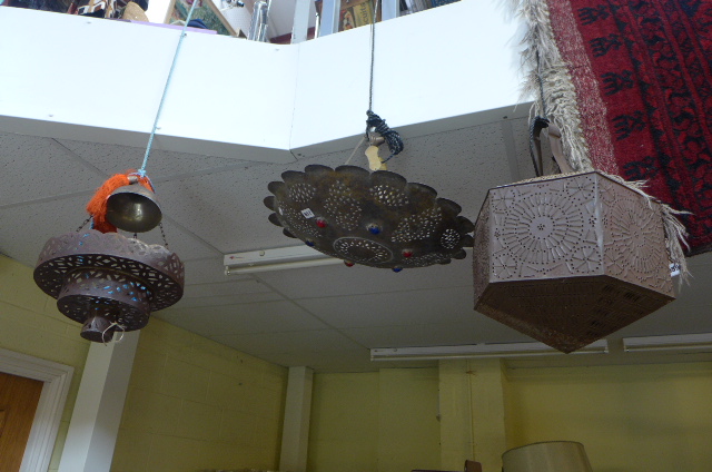 Three middle eastern metal ceiling lights, one with stone inserts.