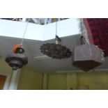 Three middle eastern metal ceiling lights, one with stone inserts.