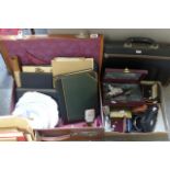 A brown leather suitcase containing various ephemera including well presented albums of photographs,
