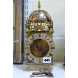 A reproduction brass lantern clock with French movement [A]