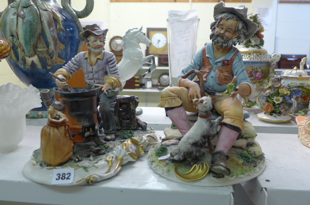 Two large Naples figurines of men at work and play. (S 57)