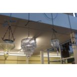 A pretty Edwardian vaseline glass hanging light and three crystal drop ceiling lights. (Centre of