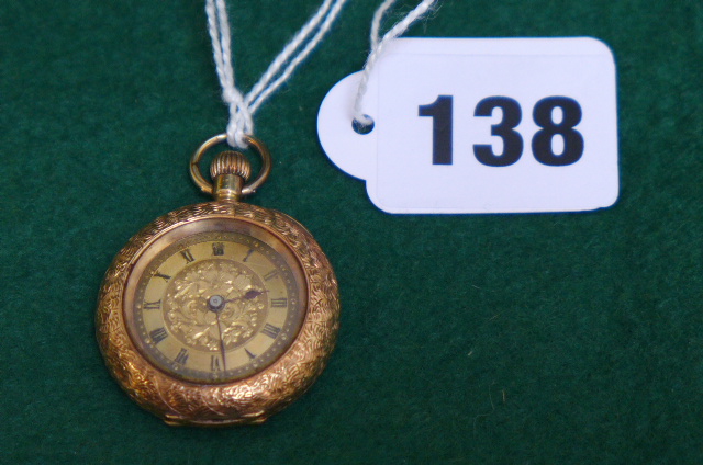 A ladies 14 ct gold open face pocket watch with engraved outer case.
