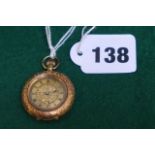 A ladies 14 ct gold open face pocket watch with engraved outer case.