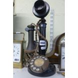 A vintage candlestick telephone [A]