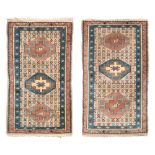 PAIR OF CAUCASIAN RUGS, MID 20TH CENTURY

octagonal medallions and secondary motifs in diamond