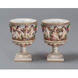 TWO CUPS IN PORCELAIN, CAPODIMONTE OR GINORI, 20TH CENTURY

decorated in relief with angels