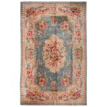 ENGLISH RUG, EARLY 20TH CENTURY

central medallion with flowers and secondary motifs with ramages,