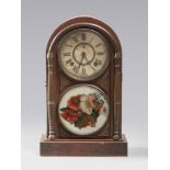 TABLE CLOCK, PROBABLY ENGLAND 1900 ca.

pik-pan wood case, in temple shape. One door on front with