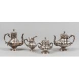 TEA AND COFFEE SET IN SILVER, 20TH CENTURY

embossed with division in bone. Comprising in a