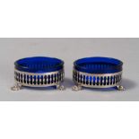 PAIR OF SALT CELLARS IN SILVER, EARLY 20TH CENTURY 

oval, bowls in blue glass. 

Size cm. 4 x 8 x