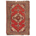 SMALL HERIZ RUG, EARLY 20TH CENTURY

star medallion on white base and secondary motifs with