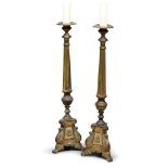 PAIR OF CANDLEHOLDERS IN GILT METAL, 19TH CENTURY

h. cm. 80.