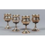 FOUR CUPS IN SILVER, 20TH CENTURY

chiselled as sapling.

Size cm. 15 x 8,5, overall weight gr.