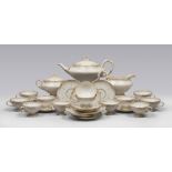 TEA SET IN PORCELAIN, GINORI, EARLY 20TH CENTURY

glazed in white and gold, pattern in relief with