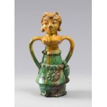 CARAFE IN CERAMIC, SICILIA 19TH CENTURY

glazing in green and ochre, shaped as female figure, with