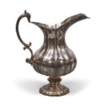 JUG IN SILVER, HALLMARK VENICE 18TH CENTURY

embossed. 

Title 800/1000.

Size cm. 27 x 16 x 25,