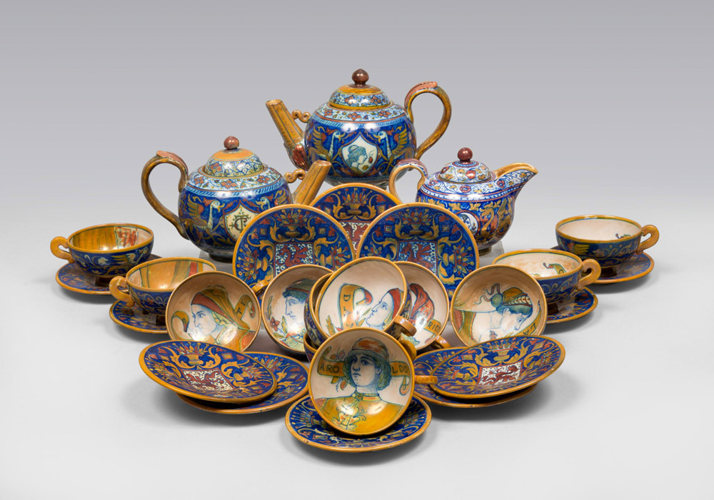 TEA SET IN CERAMIC, SANTARELLI GUALDO TADINO 1900 ca.

Designs in cobalt glazing, ochre and