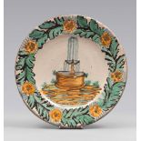 PLATE IN CERAMIC, SICILY EARLY 19TH CENTURY

glazed in green, ochre and blue, with view of