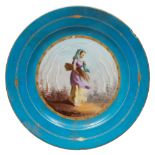 PLATE IN PORCELAIN, PROBABLY SEVRES, 19TH CENTURY

blue glaze, with painted landscape and woman